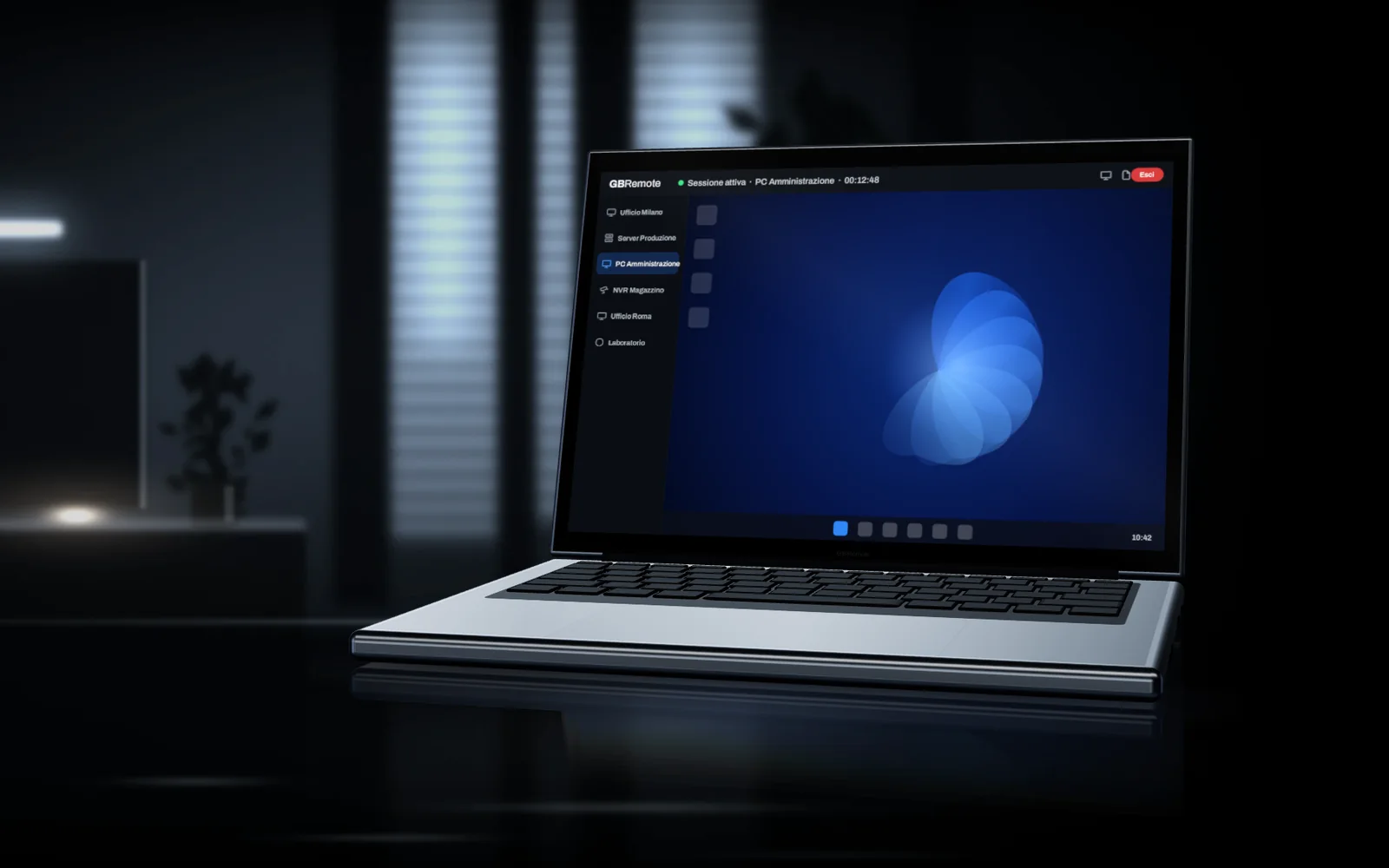 Laptop con una sessione di assistenza remota GBRemote aperta sul PC Amministrazione